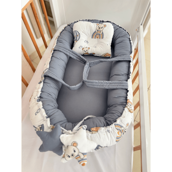 Cale bébé cocon rose avec coussin naissance et réducteur intégré
