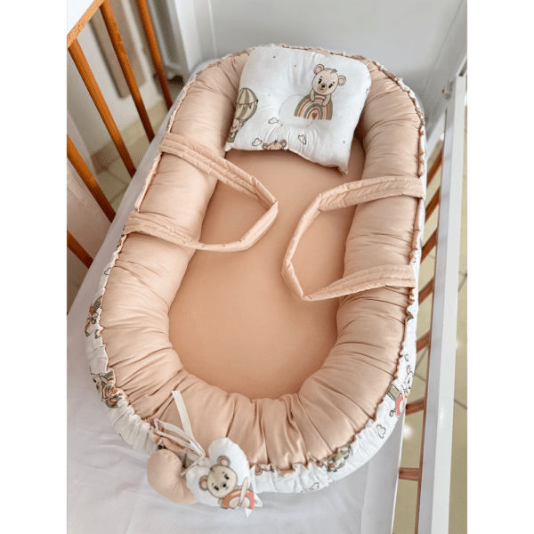 Cale bébé cocon rose avec coussin naissance et réducteur intégré